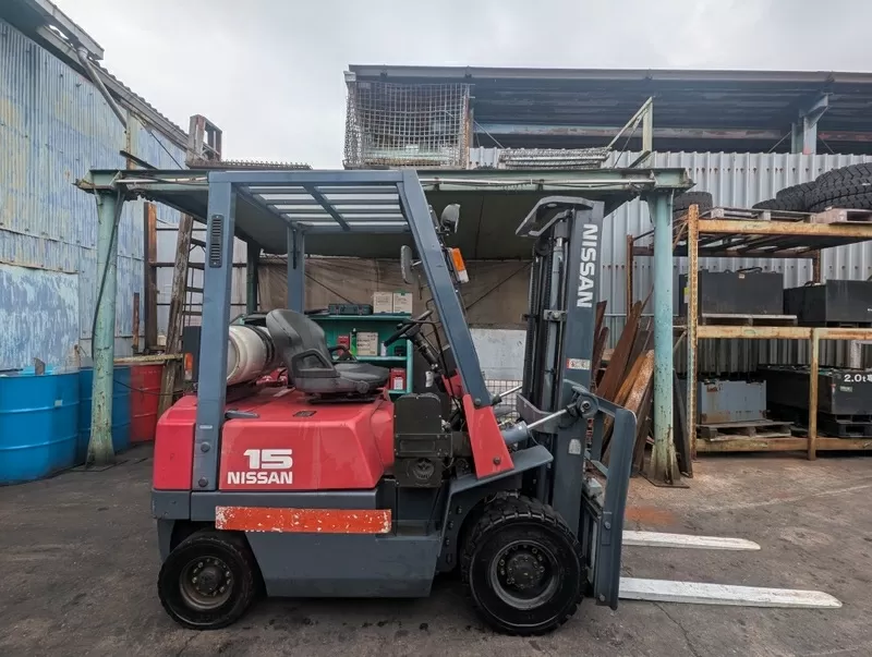 Газ-бензиновий навантажувач Nissan, з напрацюванням 3757 мотогодин 4